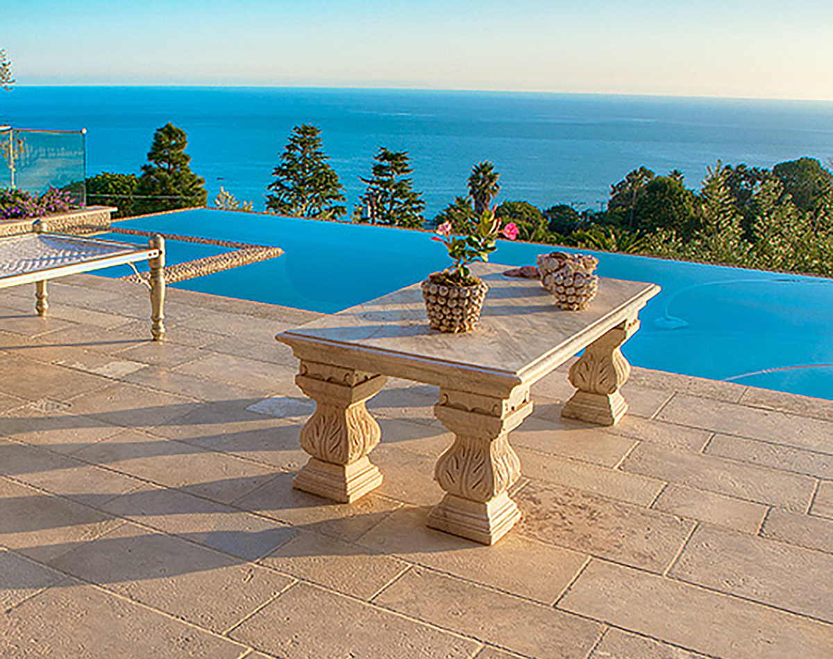 Limestone Table in a Beverly Hills Pool Patio by Phoenician Stone.