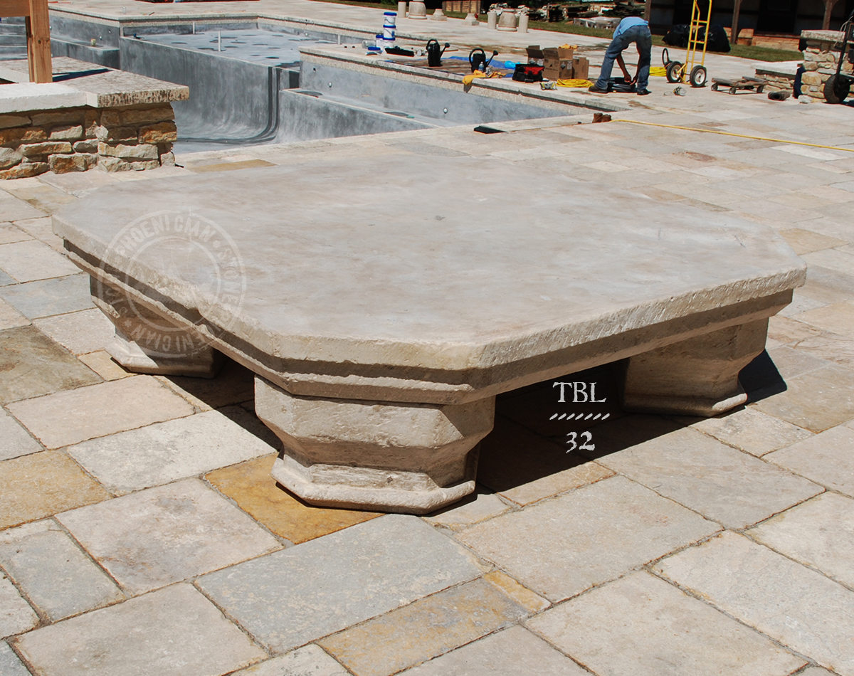 Limestone Table in a Pool Patio by Phoenician Stone.